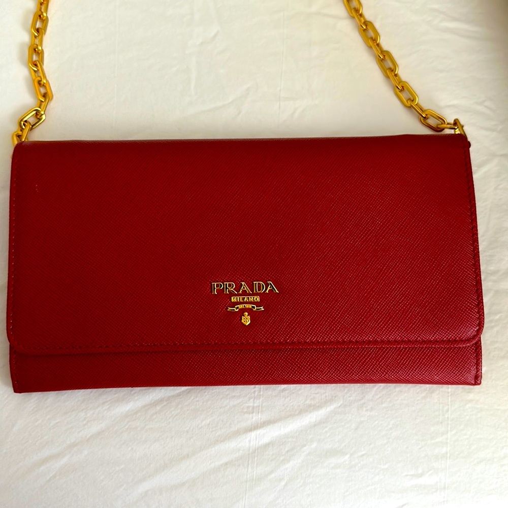 Red Prada Saffiano leather wallet with shoulder strap
